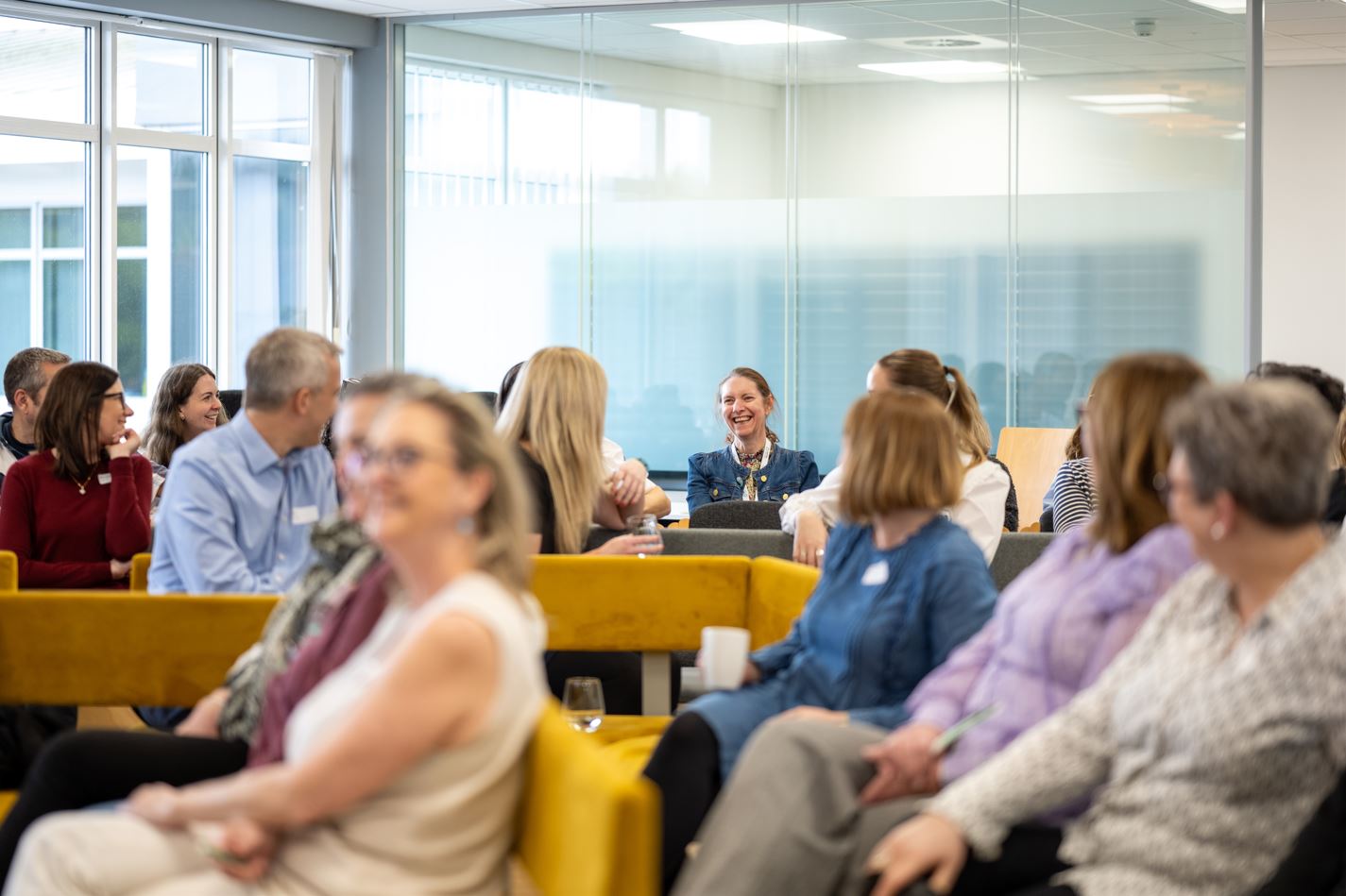 Health Innovation South West team laughing in office