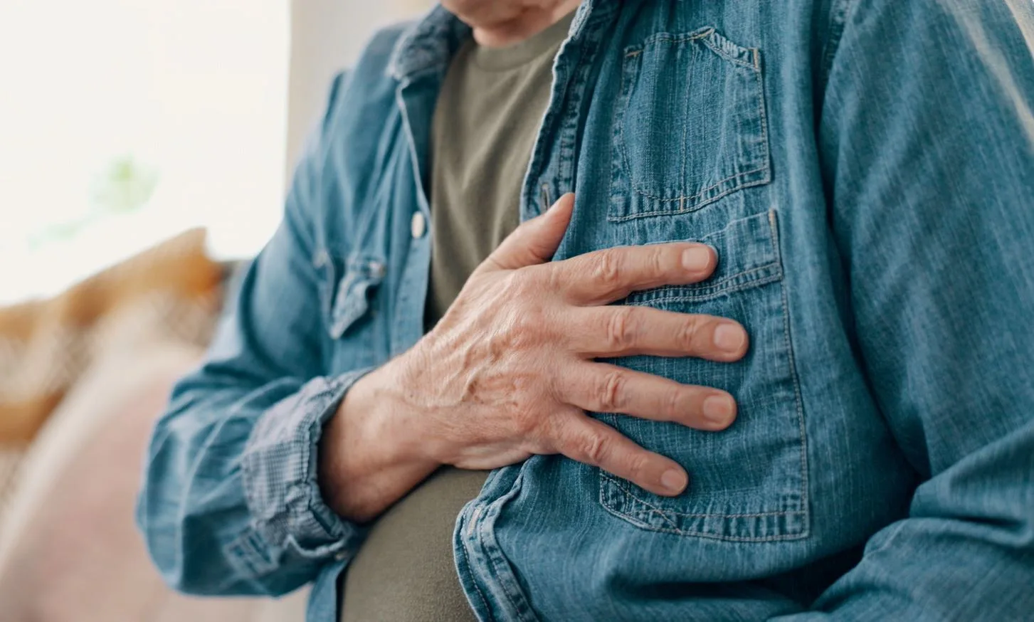 man hand on chest
