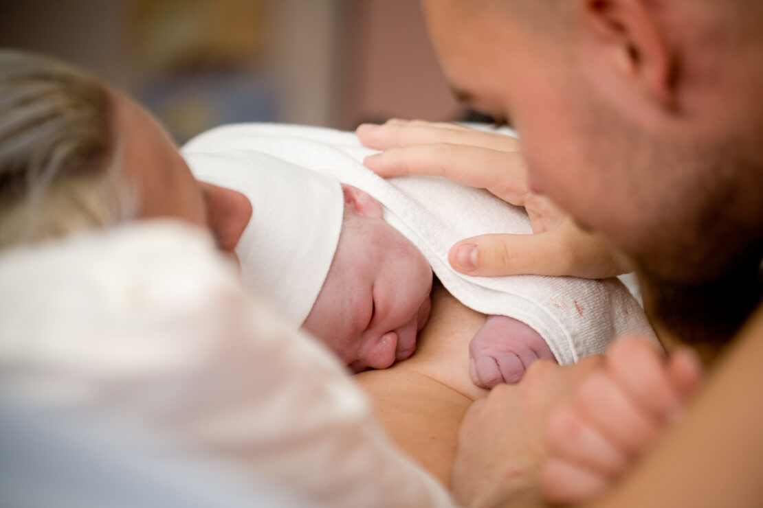 Newborn baby with parents