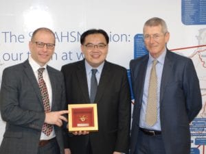 Singapore CHI present Health Innovation South West with a golden orchid gift