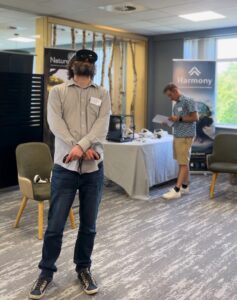 someone gazes into the air wearing a virtual reality headset
